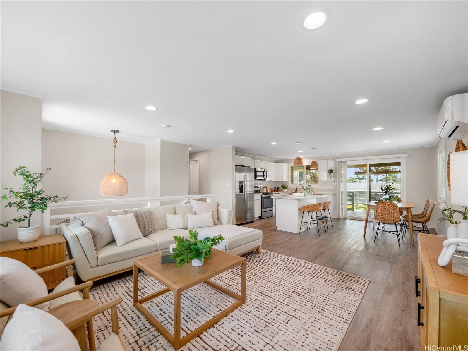 Open concept living, dining and kitchen area