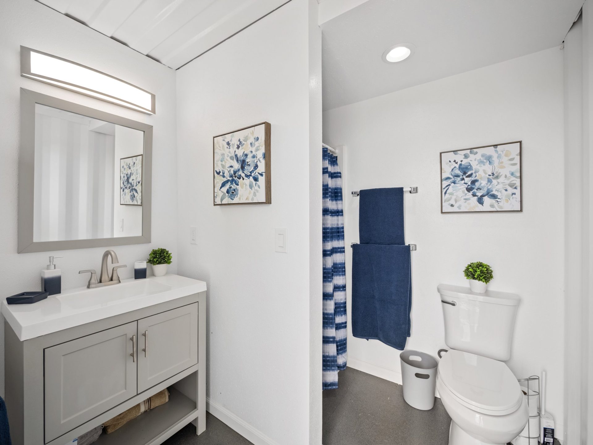 Full bathroom with vanity and shower