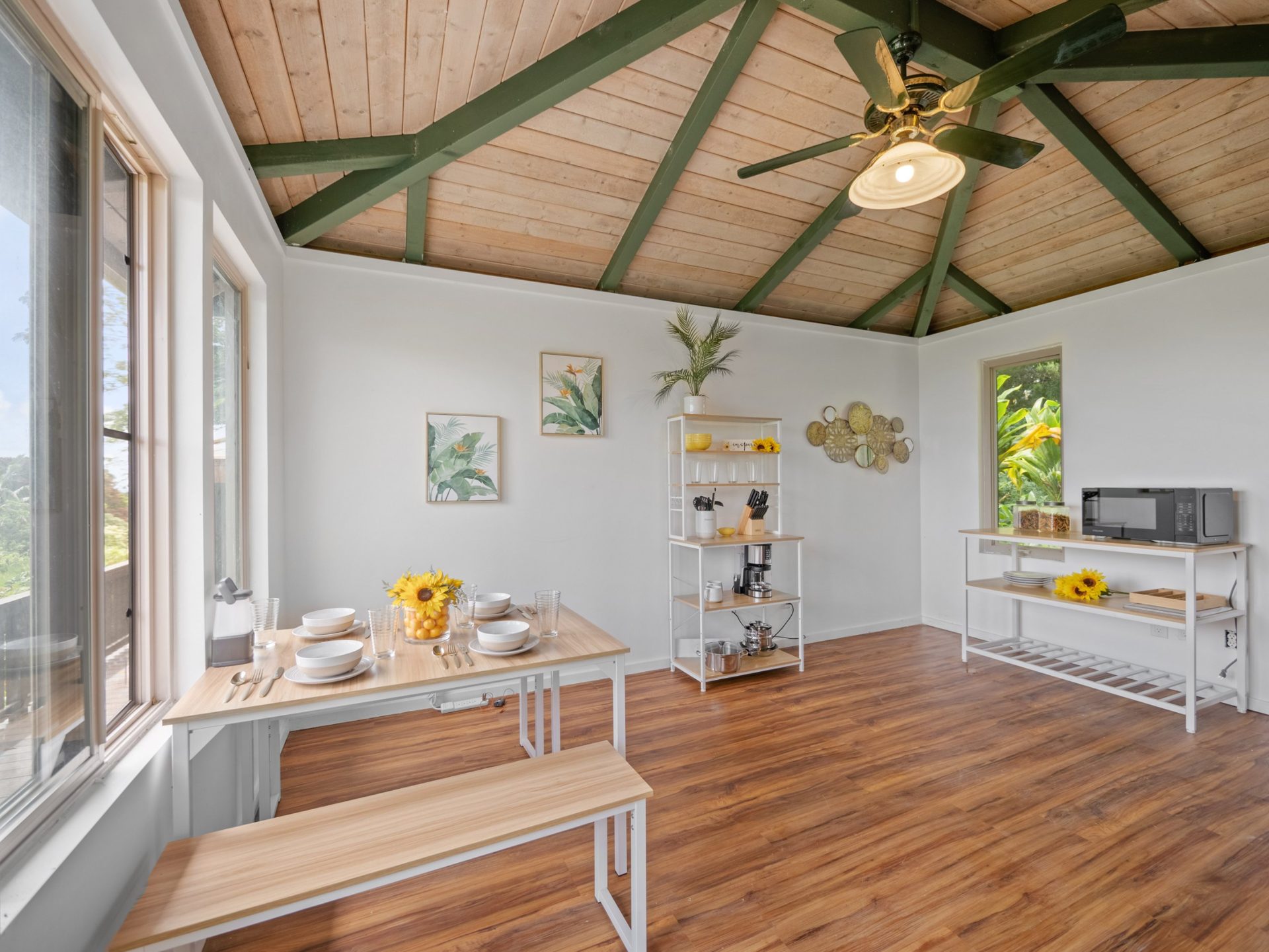 Luxury shed interior with dining area and kitchen shelving