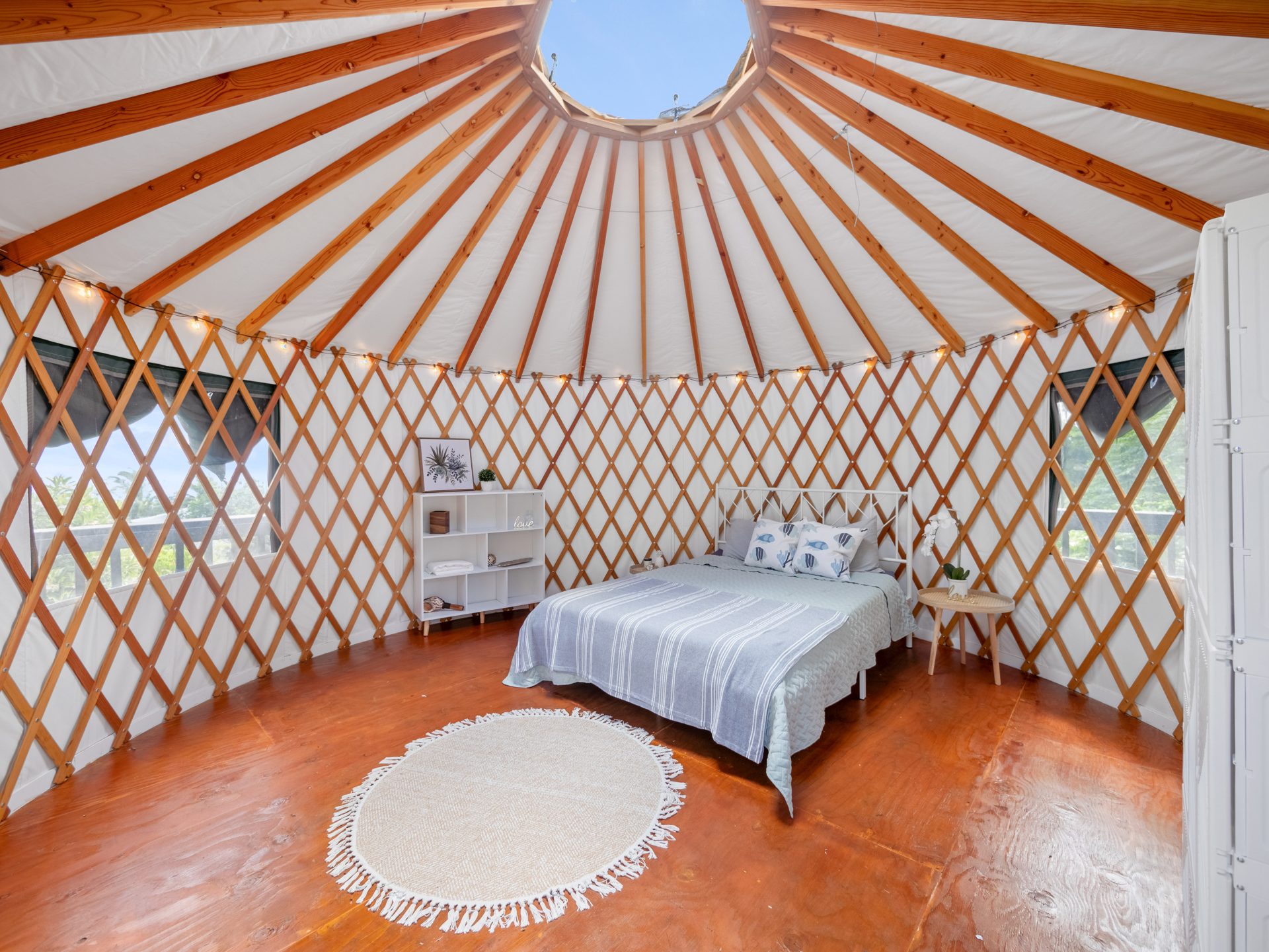 Yurt interior with bed and skylight