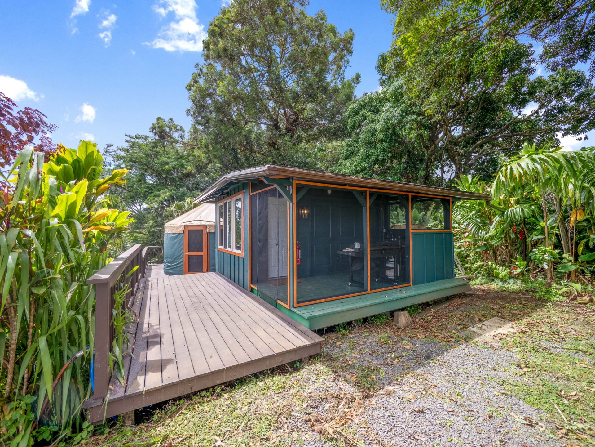 Luxury shed with screened porch, next to the yurt and deck