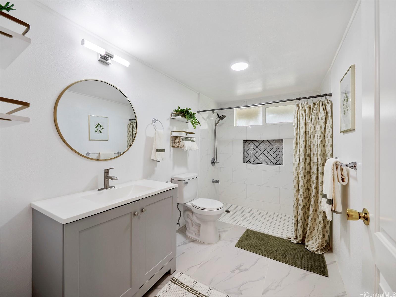 Updated bathroom with walk-in tile shower