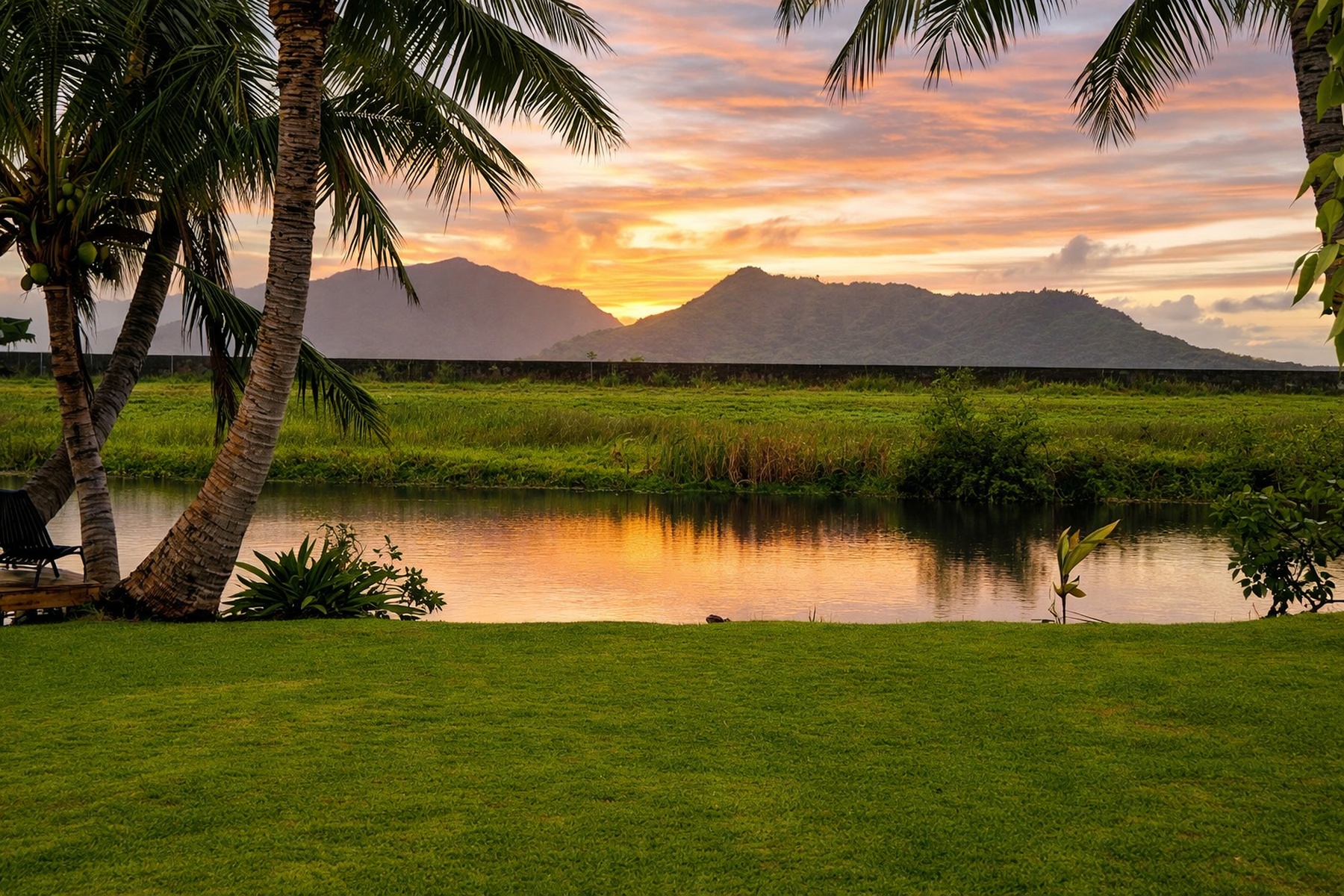Sunset over the stream and Koolau mountains from the lawn